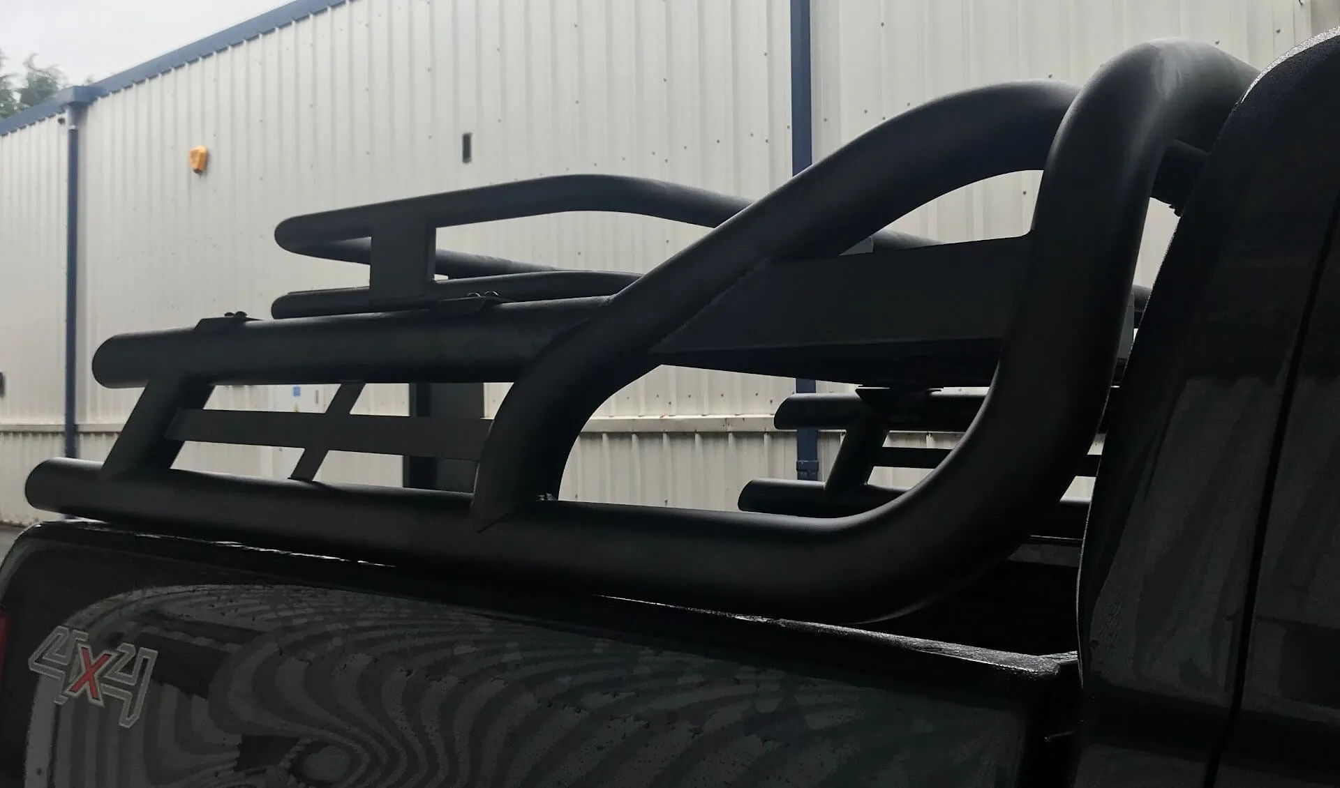 Black Long Arm Roll Sports Bar with Cargo Basket Rack for the Ford Ranger 2012 