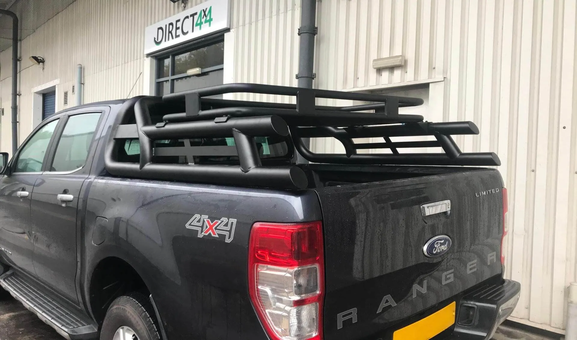 Black Long Arm Roll Sports Bar with Cargo Basket Rack for the Ford Ranger 2012 