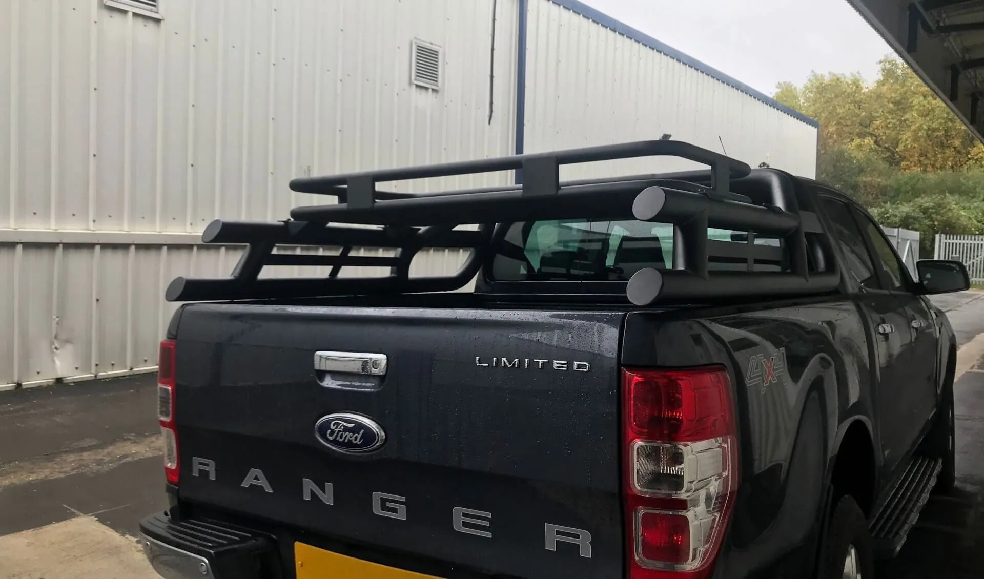 Black Long Arm Roll Sports Bar with Cargo Basket Rack for the Ford Ranger 2012 