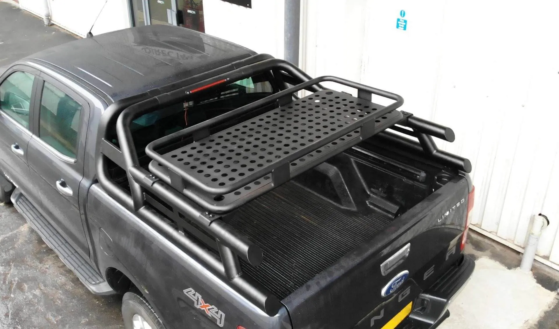 Black Long Arm Roll Sports Bar with Cargo Basket Rack for the Ford Ranger 2012 