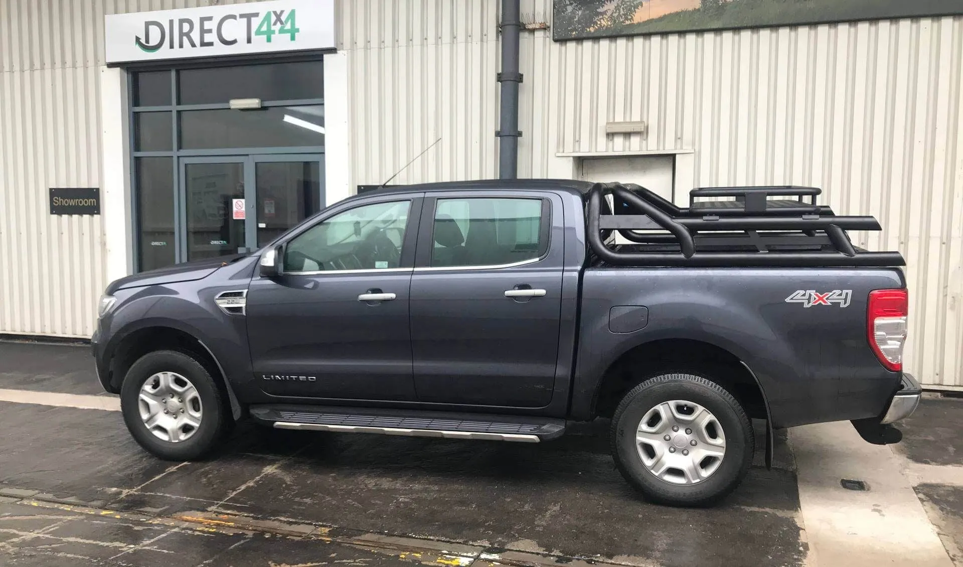 Black Long Arm Roll Sports Bar with Cargo Basket Rack for the Ford Ranger 2012 