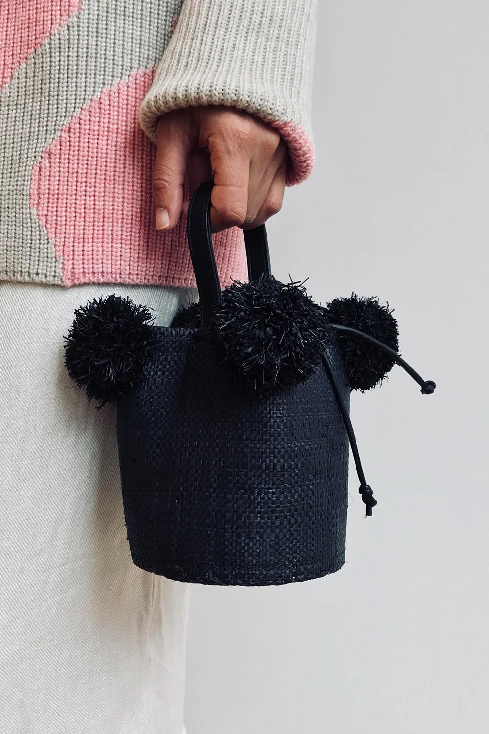 Edun Raffia Mini Pom Pom Bag in Black