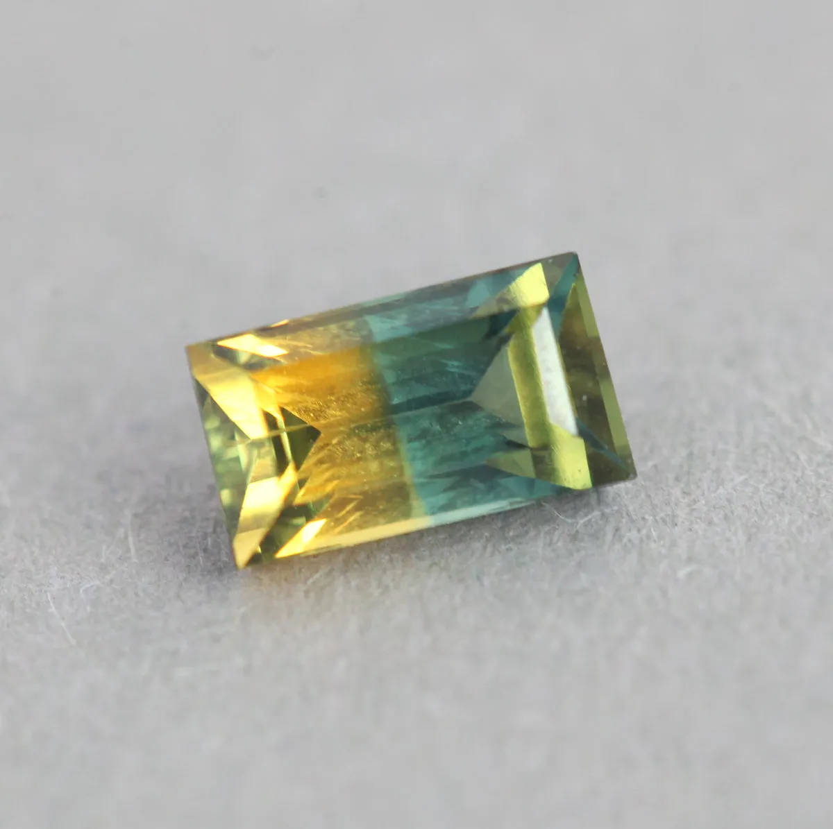 Loose 0.83 Ct Rectangle Teal And Orange Yellow Sapphire