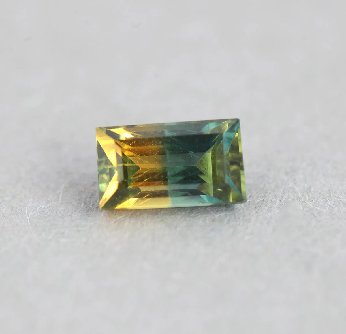 Loose 0.83 Ct Rectangle Teal And Orange Yellow Sapphire