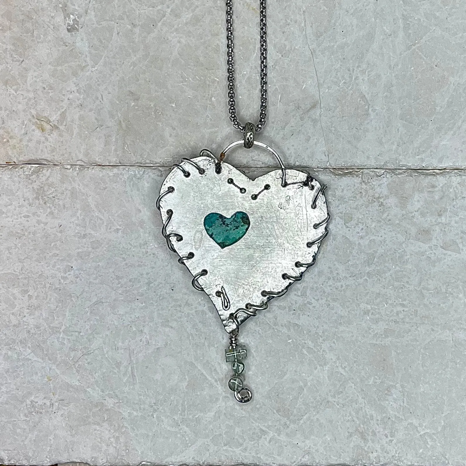 M1-Stitched and Fixed Sterling Heart Medallion