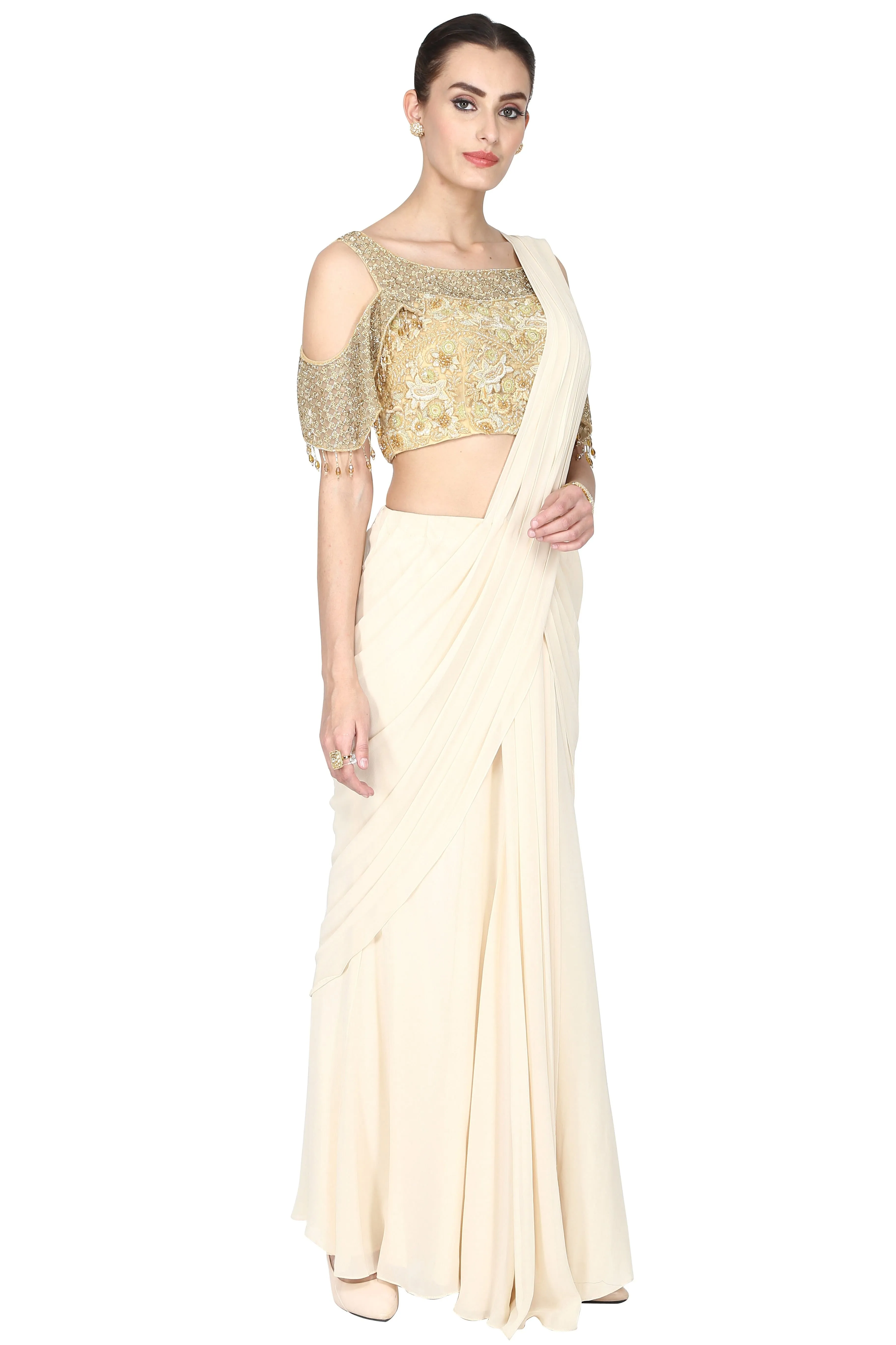 Off-white pre-drape saree with cold sleeves set.