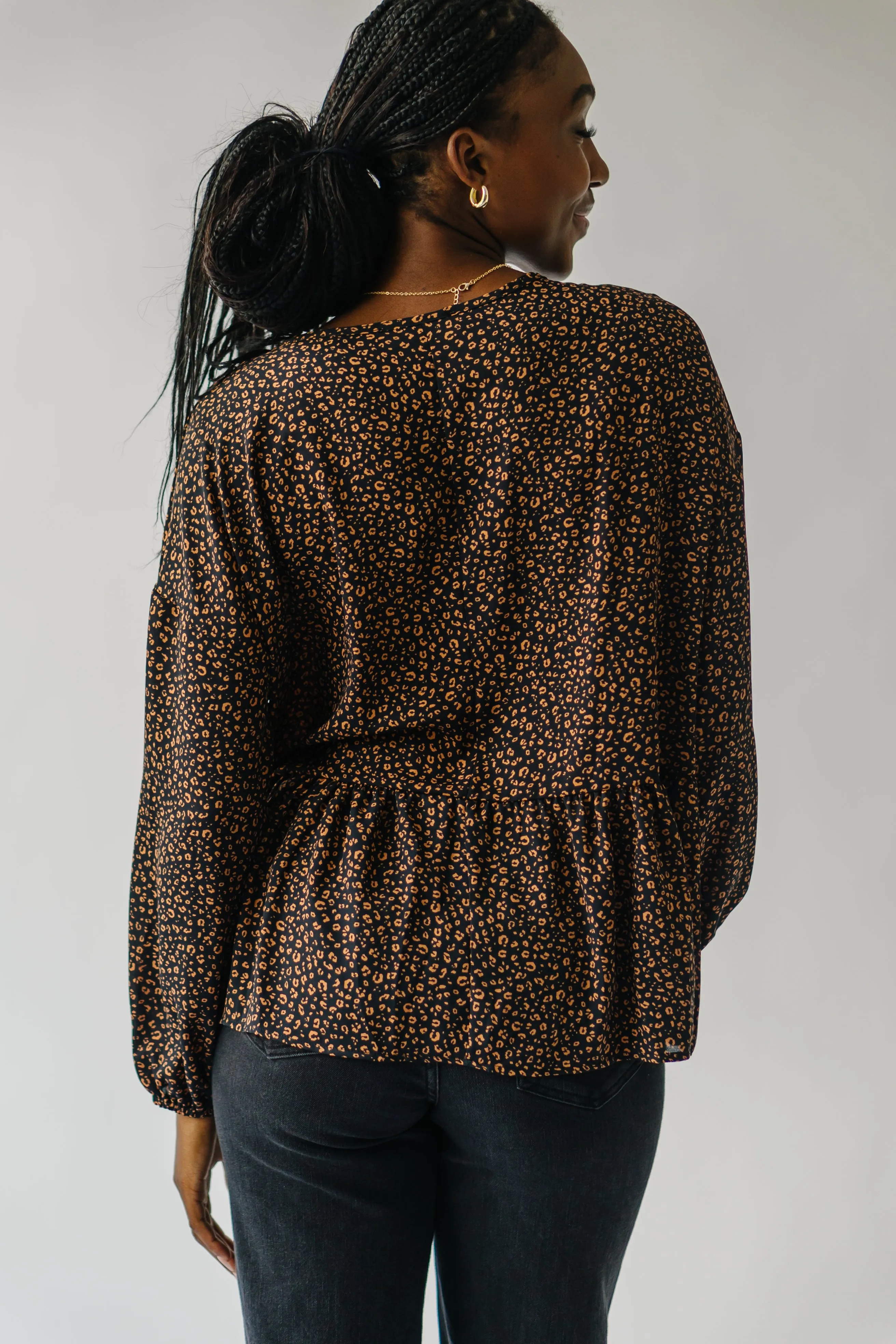 The Solana V-Neck Cheetah Peplum in Black   Terracotta